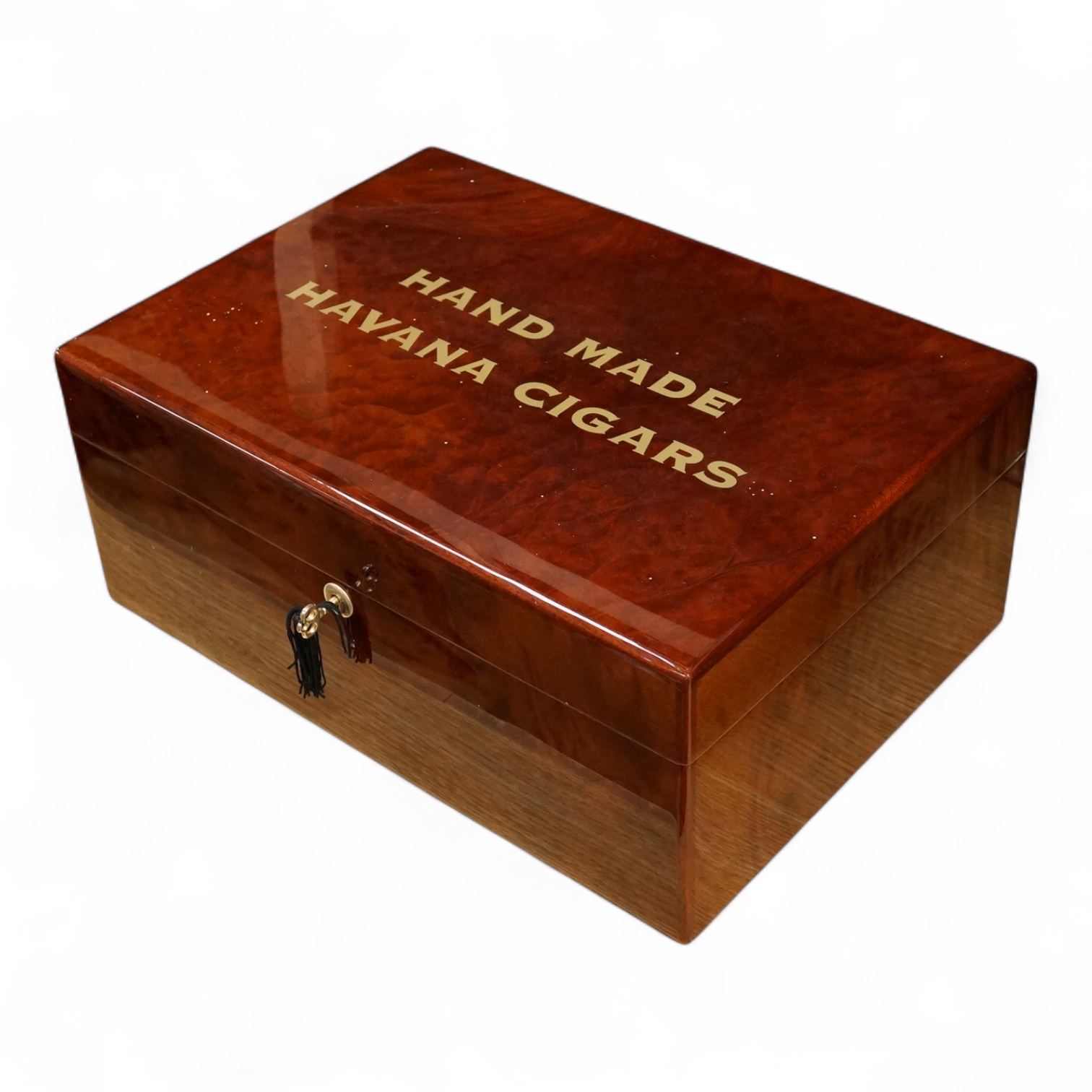 A humidor ‘Hand Made Havana Cigars’, with double cigar pouch, with key, 44cm wide